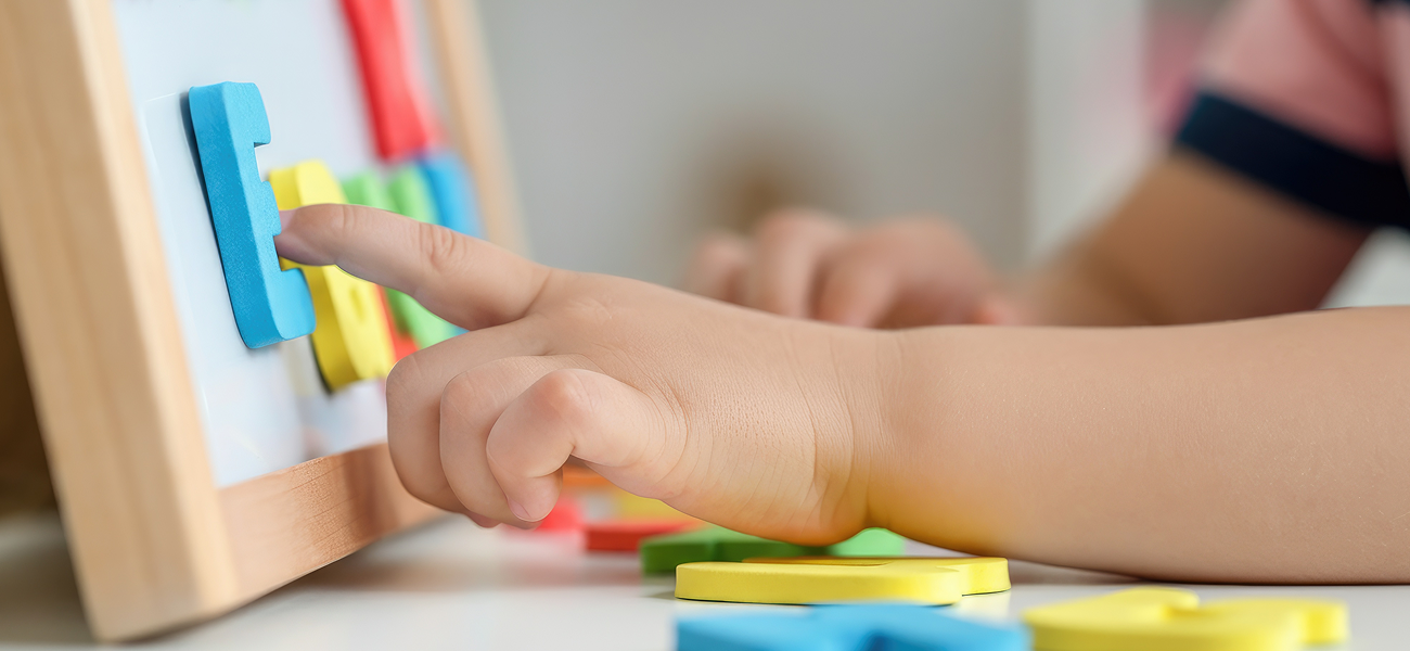 child playing with numbers