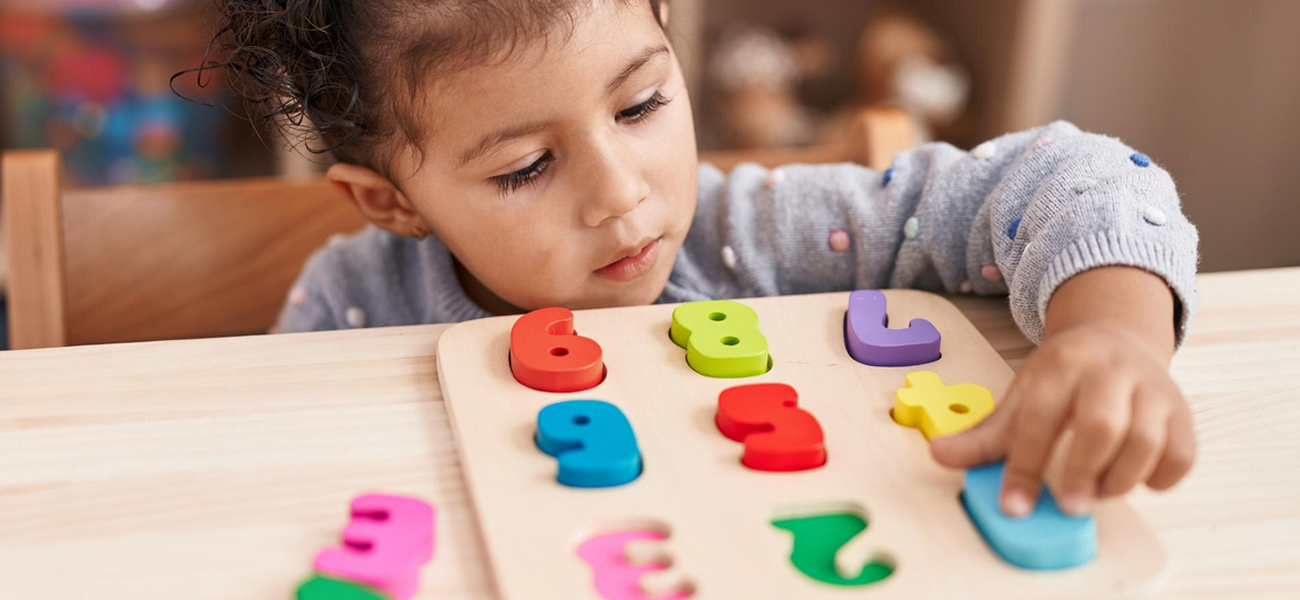 child playing with numbers