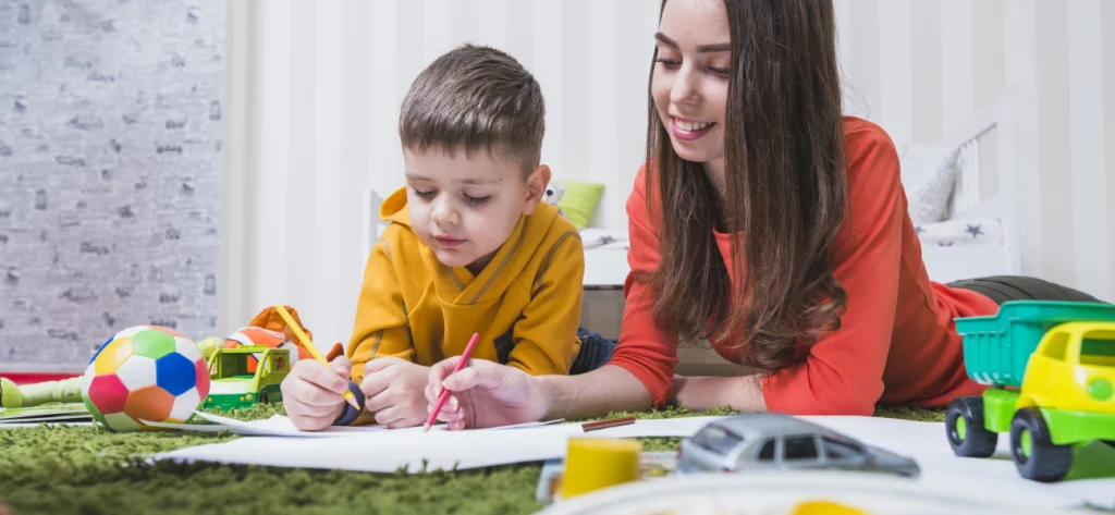 educator teaching a child in a chidlcare facility