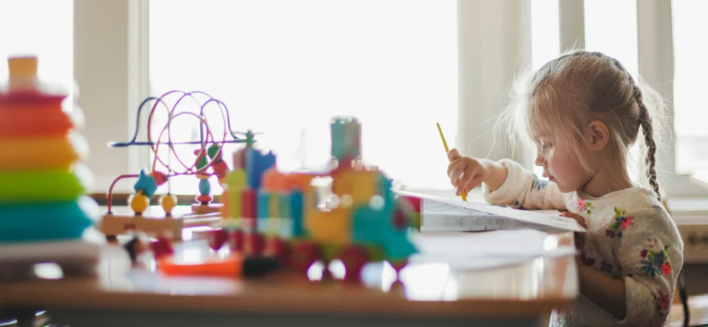 child drawing in a montessori